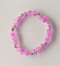 Pink Crackle Glass Stretch Bracelet with Silver Star Spacers