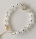 Clear Crackle Glass & Gold Stretch Bracelet with Coin Charm