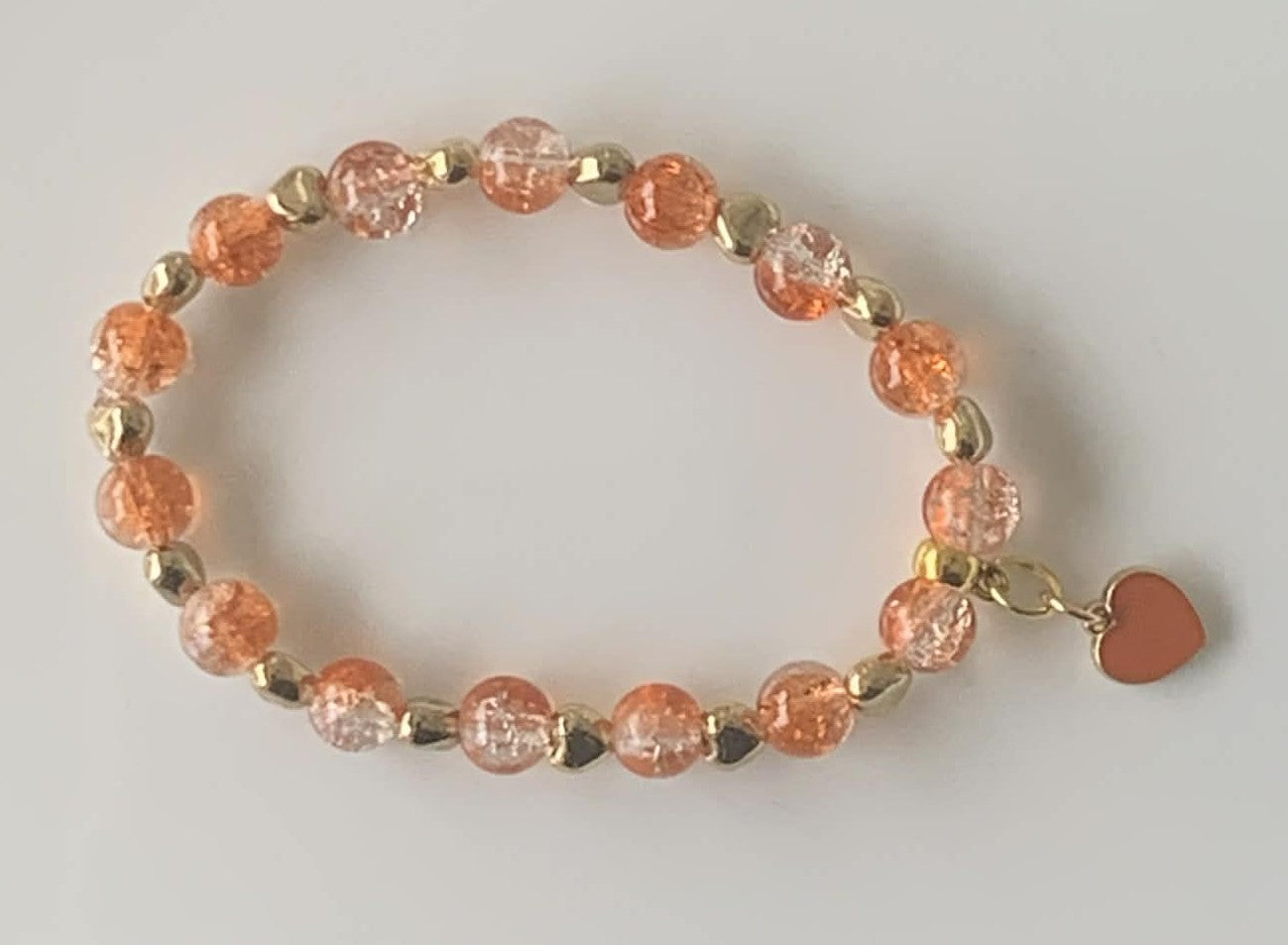 Peach Crackle Glass Stretch Bracelet with Gold Nugget Spacers & Peach Heart Charm