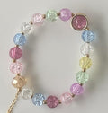 Pastel Rainbow Crackle Glass Adjustable Bracelet with Gold Spacers & Pink Coin Accent