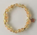Golden Champagne Crackle Glass Stretch Bracelet with Gold Spacers & Orange Flower Charm