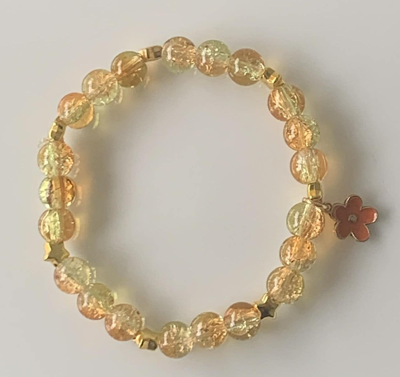 Golden Champagne Crackle Glass Stretch Bracelet with Gold Spacers & Orange Flower Charm