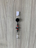 Handmade black car beaded belt clip with red accents