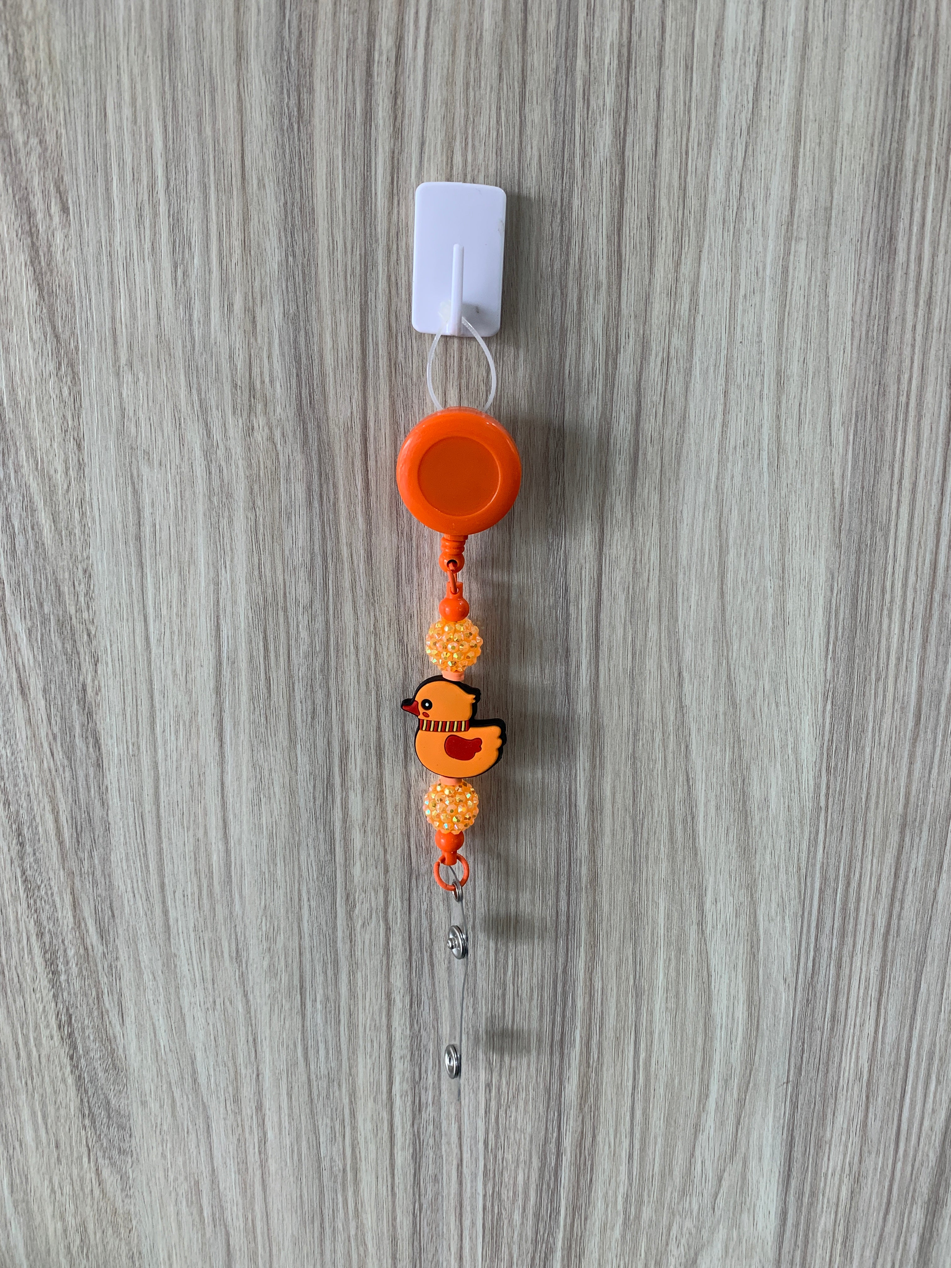 Handmade orange duck beaded belt clip
