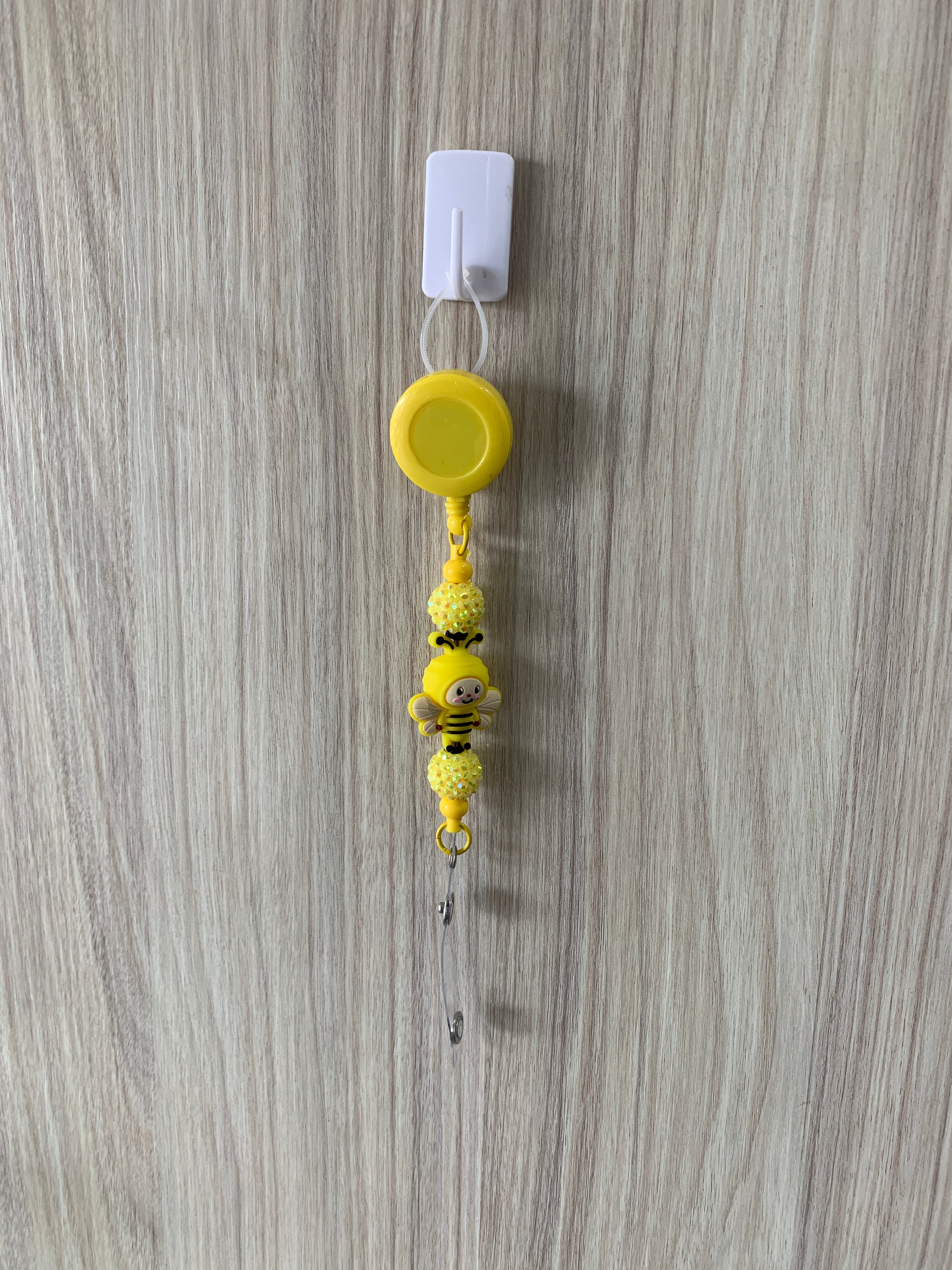 Handmade yellow bumblebee beaded belt clip