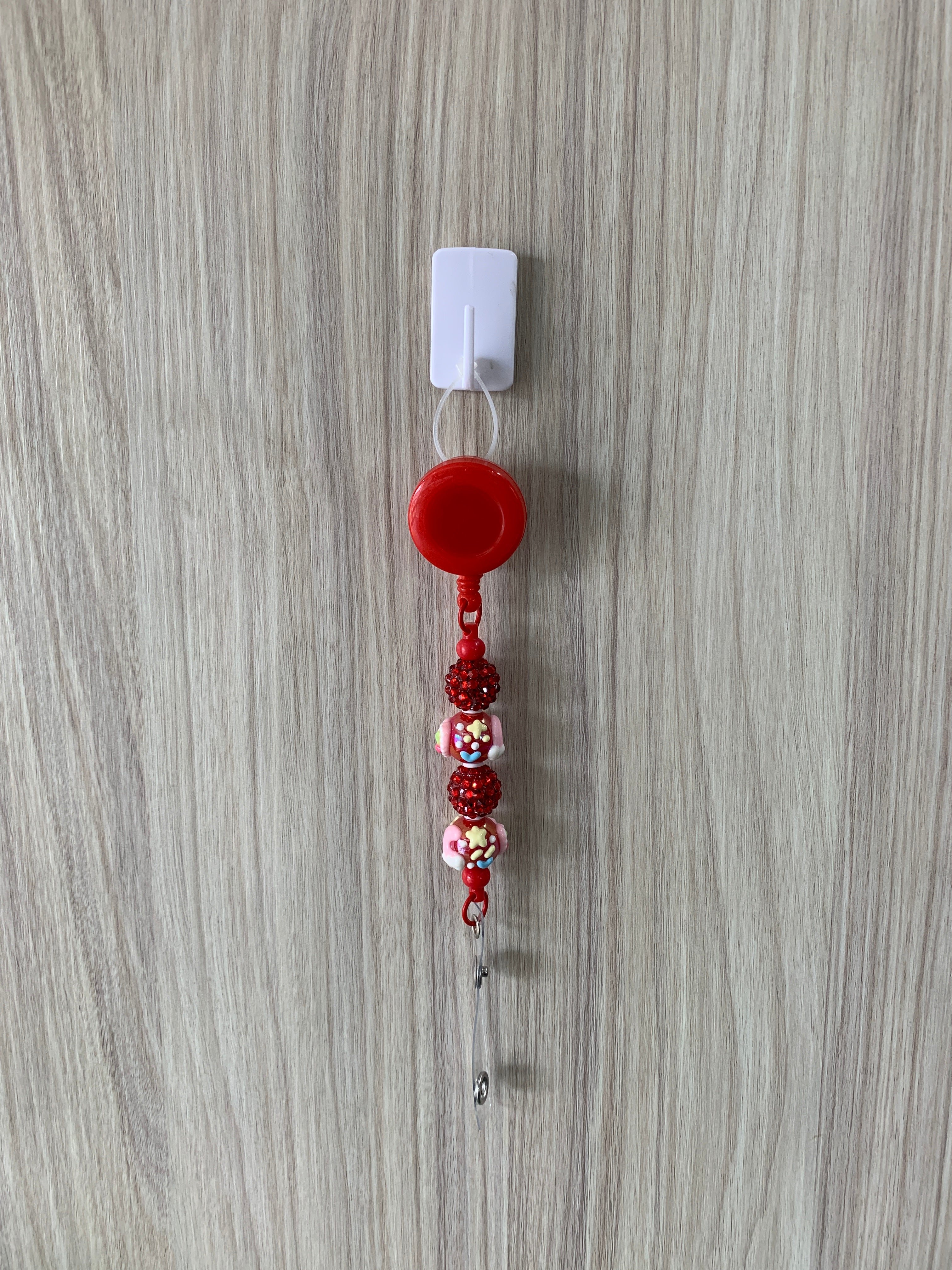Handmade red cupcake beaded belt clip