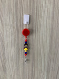 Handmade red princess beaded belt clip with blue and yellow accents