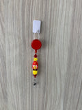 Handmade red and yellow firefighter gnome beaded belt clip