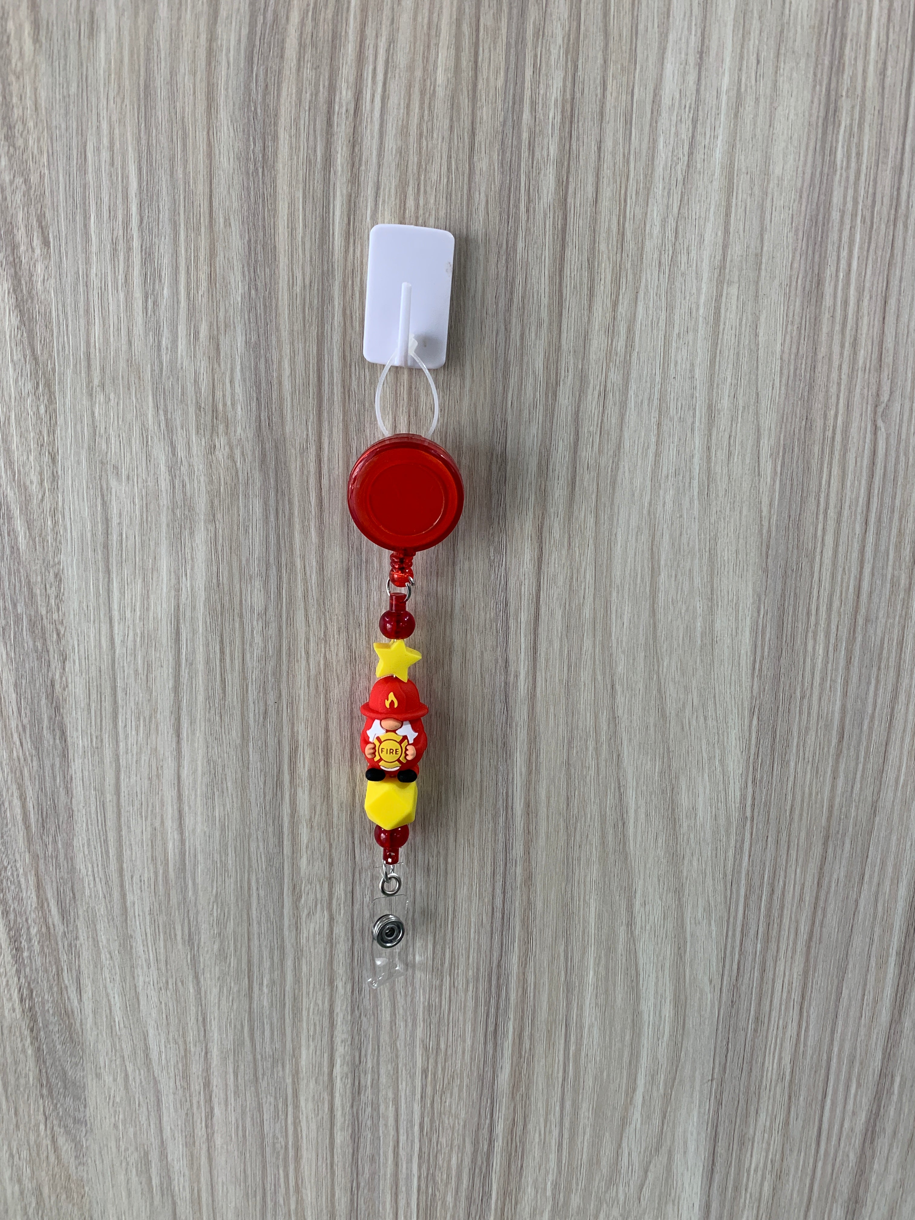 Handmade red and yellow firefighter gnome beaded belt clip