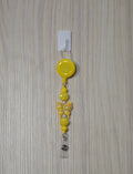 Handmade sunshine yellow butterfly beaded belt clip