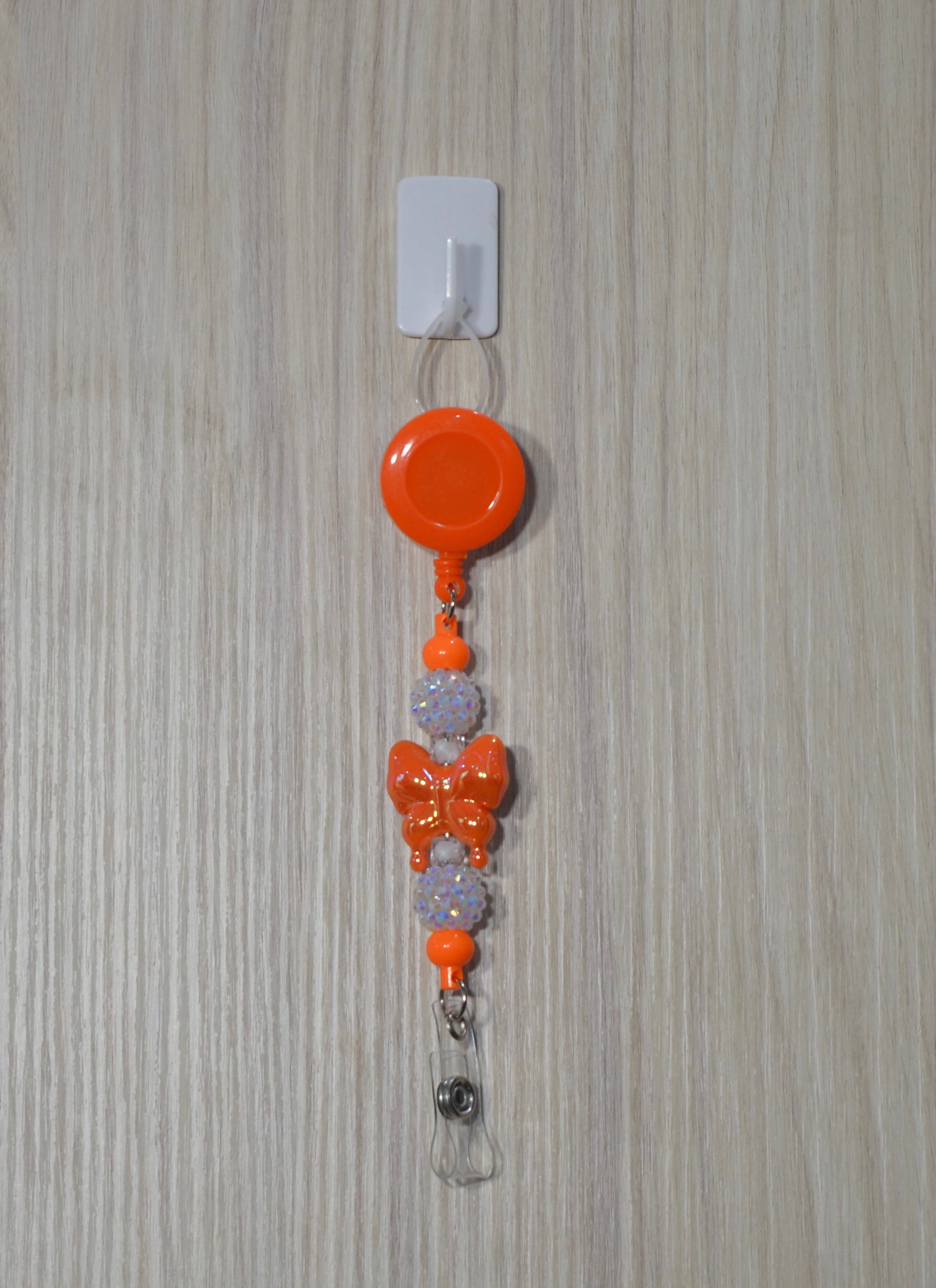 Handmade orange and lavender butterfly beaded belt clip
