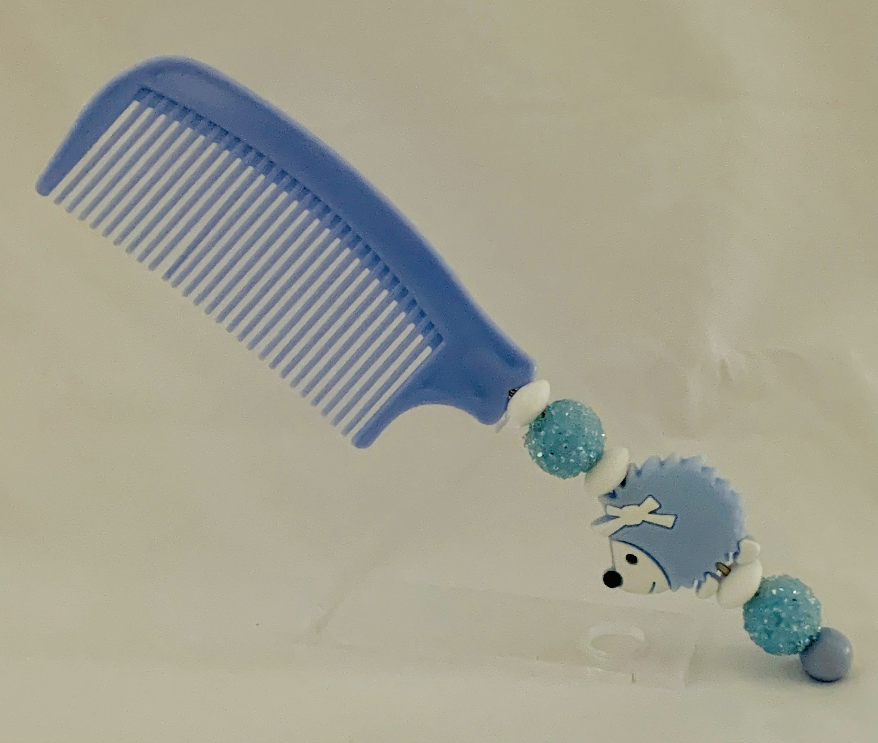 Blue Hedgehog Charm Glitter Pom Pom Beaded Comb