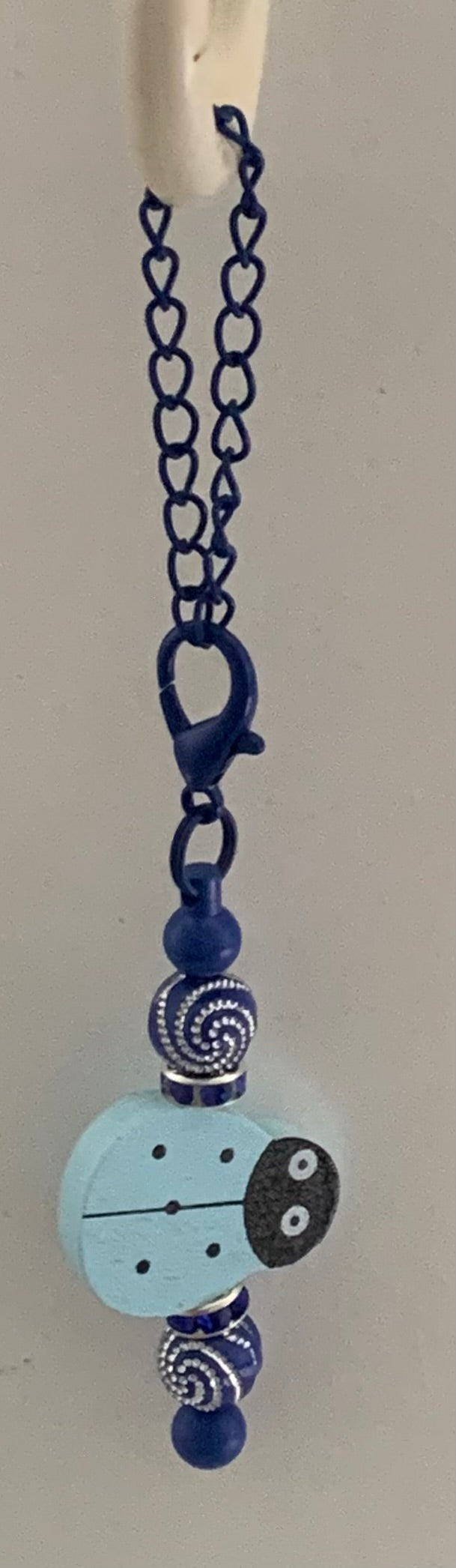 Cup Charm – Blue Wooden Ladybug with Swirl Beads on Navy Chain